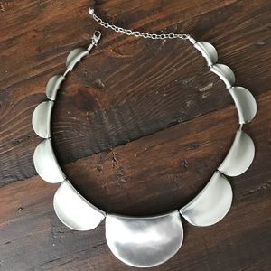 Double-sided silver tulip necklace.